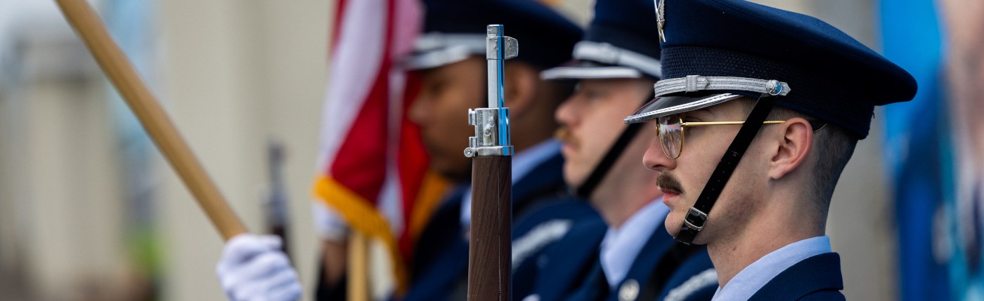 base honor guards at airport mural event in Auburn, WA
